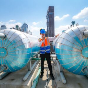 Industrial factory ceiling with ventilation system and lights. Ventilation ducts.